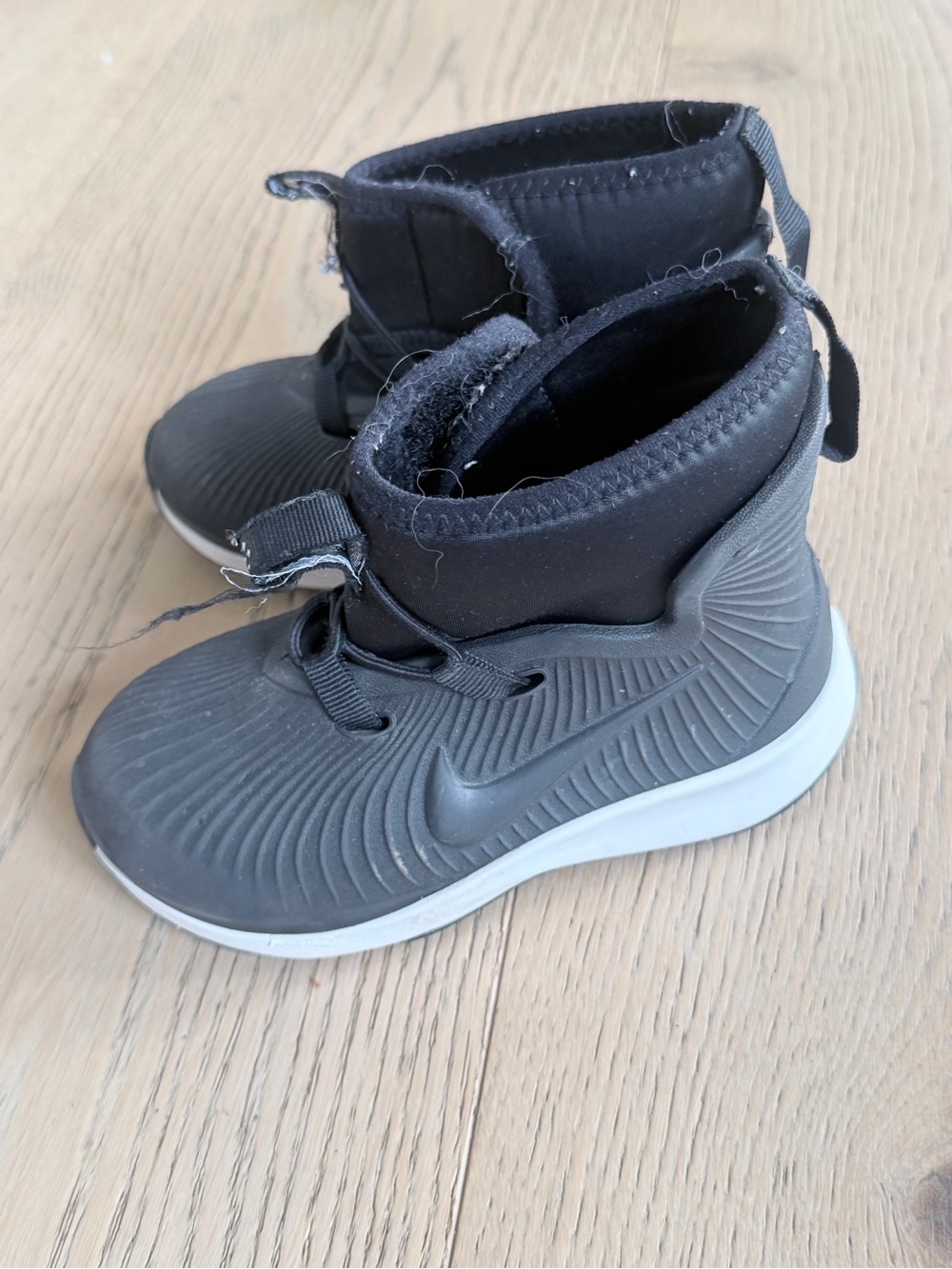 Kids Black Nike snow rain boot
